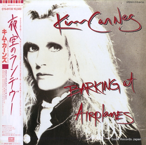 CARNES, KIM barking at airplanes EYS-81720