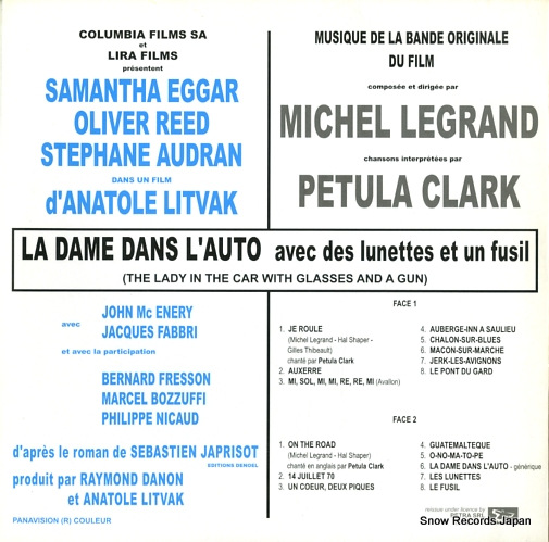 LEGRAND, MICHEL la dame dans l'auto avec des lunettes et un fusil PTRLPZA03