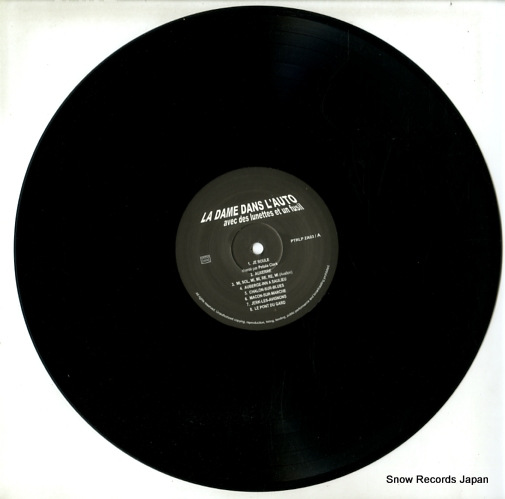 LEGRAND, MICHEL la dame dans l'auto avec des lunettes et un fusil PTRLPZA03