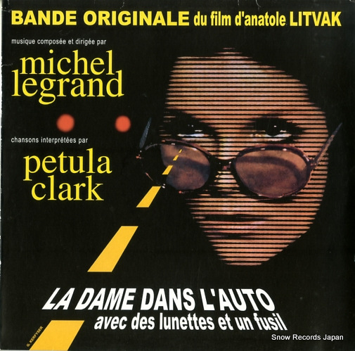 LEGRAND, MICHEL la dame dans l'auto avec des lunettes et un fusil PTRLPZA03
