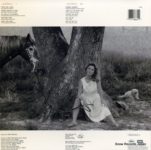TUCKER, TANYA strong enough to bend C1-48865